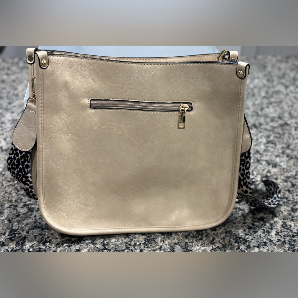Ivory crossbody with leopard strap
